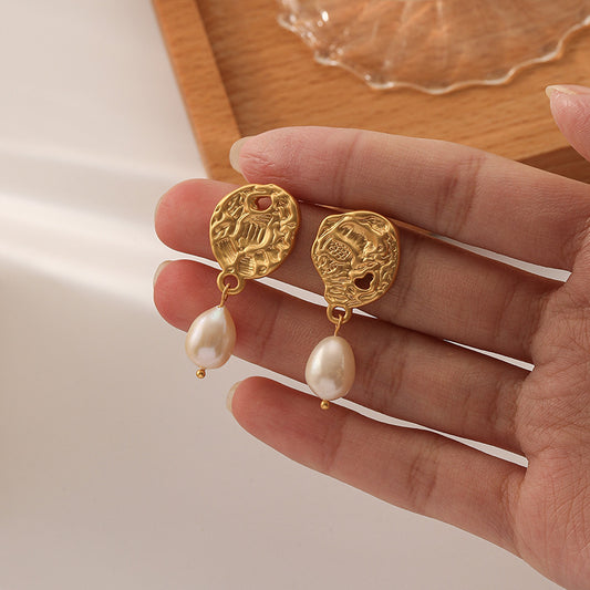 Asymmetric embossed freshwater pearl earrings