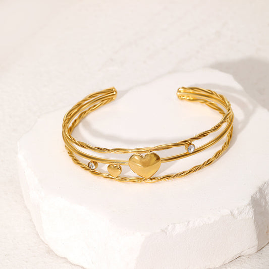 Triple heart shape open gold plated bracelet