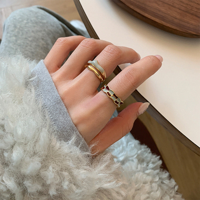 Enamelled checkerboard ring