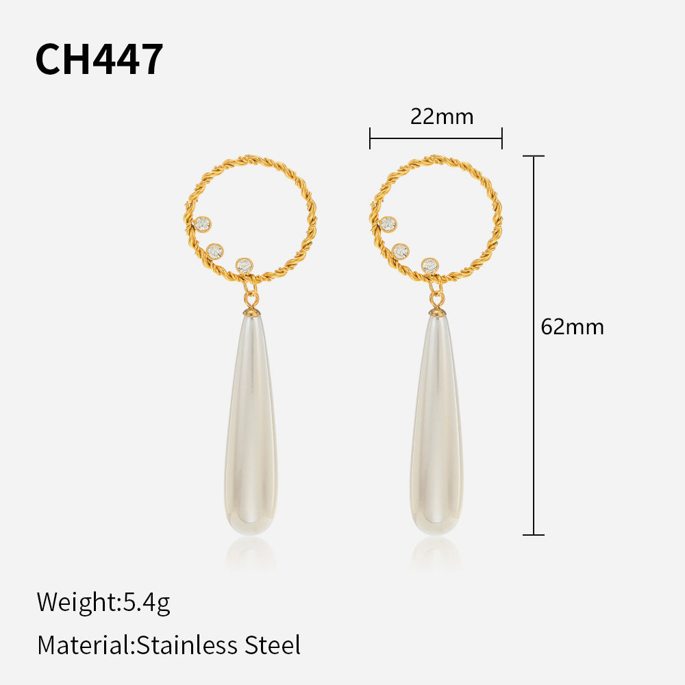 Gold-plated earrings with teardrop pearls