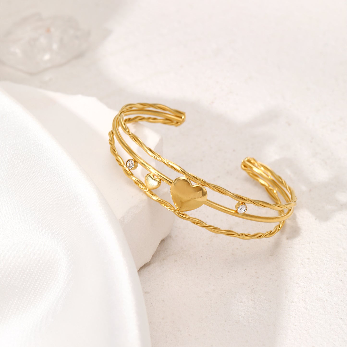 Triple heart shape open gold plated bracelet