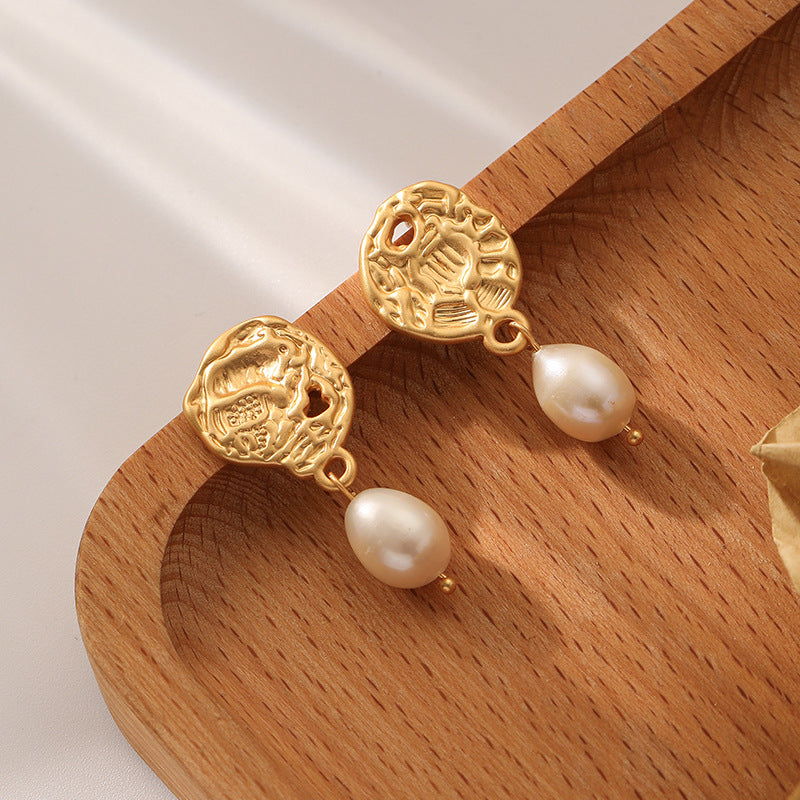 Asymmetric embossed freshwater pearl earrings