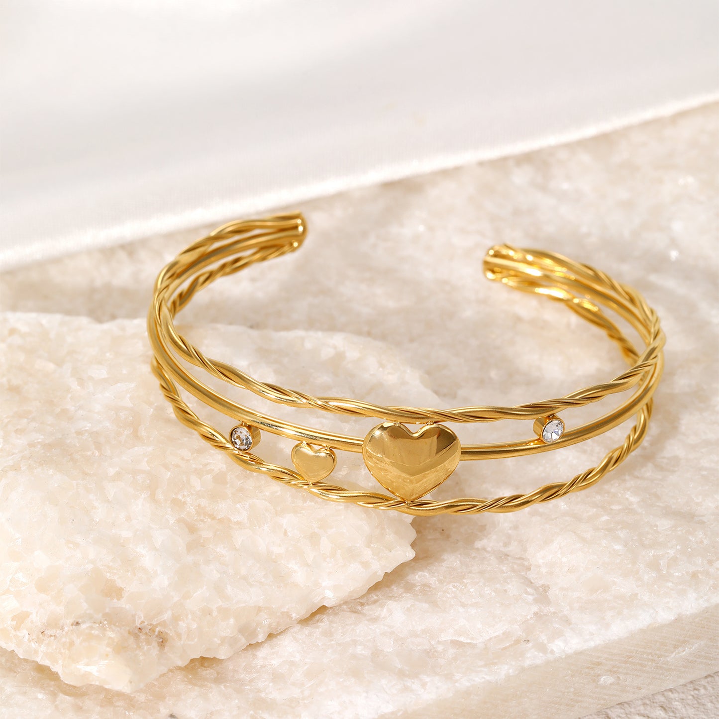 Triple heart shape open gold plated bracelet