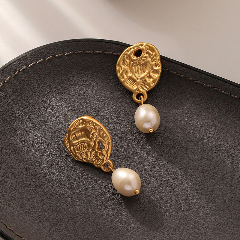 Asymmetric embossed freshwater pearl earrings